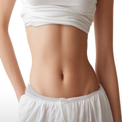 Woman showing her smooth hairless stomach 