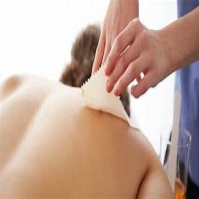 Person receiving a back wax 